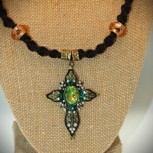 Gold Toned Faceted Oval Dichroic Gold Toned Cross on a handmade Black Hemp Chain